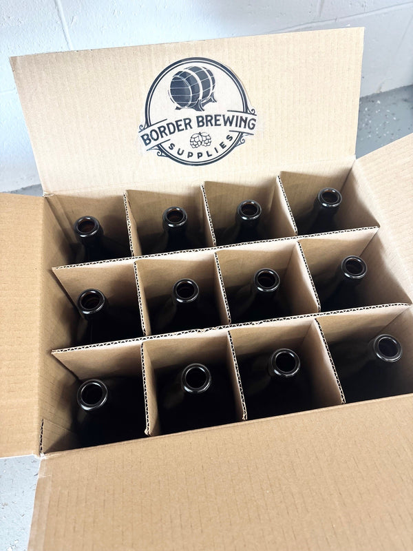 Cardboard box with bottles and Border Brewing logo on a light gray background