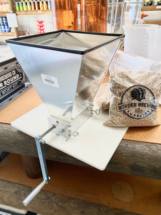 Grain Mill Malt Muncher 2 Roller Grain Mill with Base Mounting Board Mill it in style with your new cold steel rollers with 6061 Aluminum chassis. This Malt Muncher is adjustable to get your grain bill crushed exactly the way you want it.