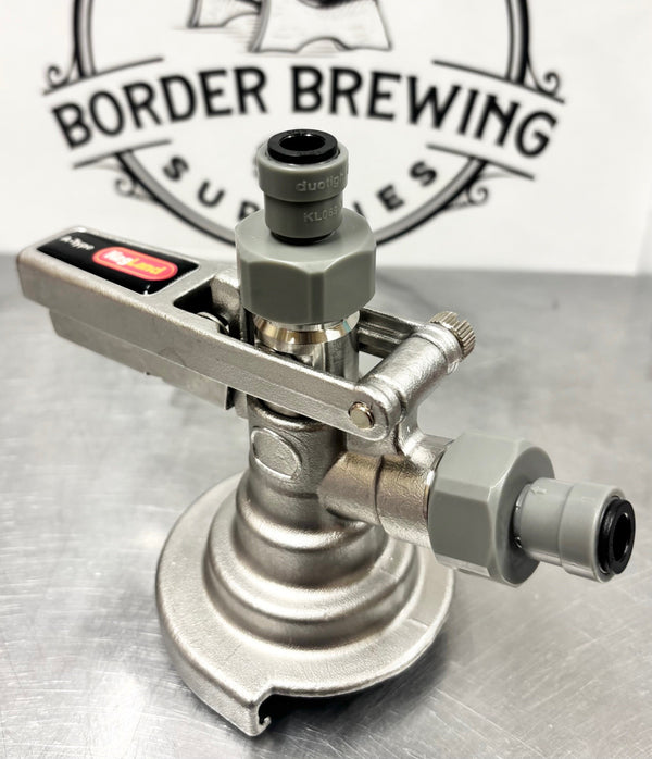 Gas inlet and beer outlet connections on an A-Type commercial keg coupler