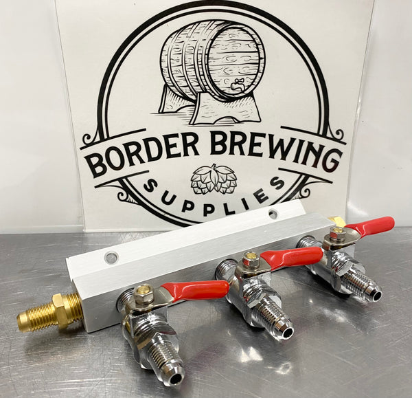 Gas Manifold 3 way Gas Line splitter with one way check valve. This gas manifold has a one way check valve that will stop beer from flowing back into your regulator.  The 3 way gas manifold is rated for 100psi and has MFL threads that accommodate push in duotight fittings. 